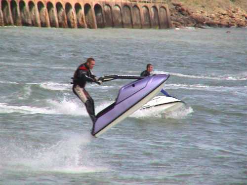 Jetskiers showing off 3