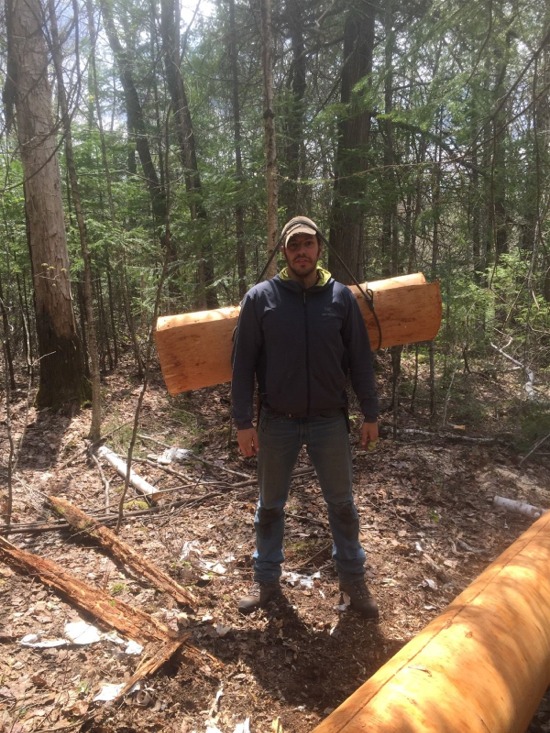 Canoe skin rolled for portage out of forest