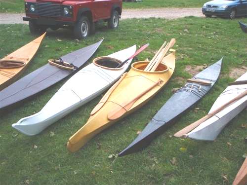 Traditiional baidarkas and kayaks